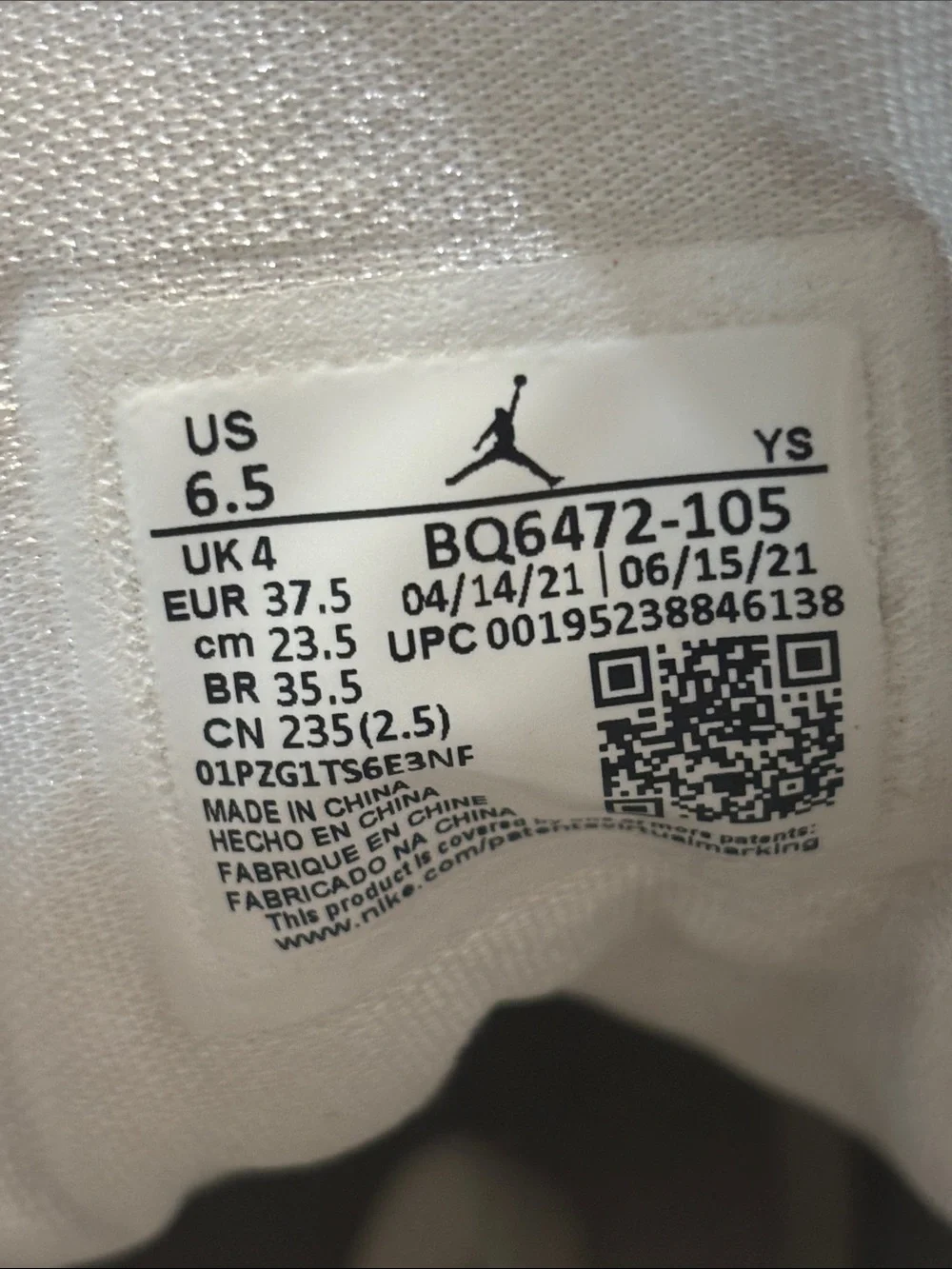 Nike Women’s Mid-Top Sneakers in White and Light Gray